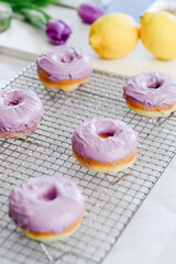 Colorful dessert purple donuts Spring Easter