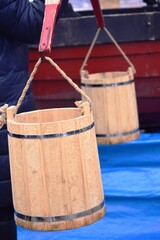 Wooden buckets on a rocker for carrying water