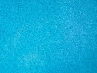 Fototapeta na wymiar texture of cracked blue ceramic