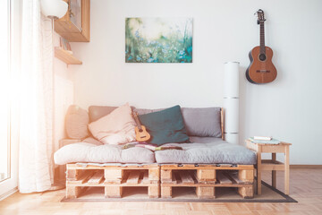 Simple lifestyle: Cozy living room with palette furniture, palette sofa