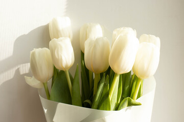 a bunch of white natural tulips