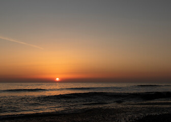 Naklejka premium sunset at the beach