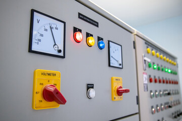View of Electrical main distribution unit with selecter switch with meter and push switch and pilot lamps.