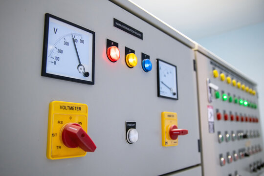 View of Electrical main distribution unit with selecter switch with meter and push switch and pilot lamps.