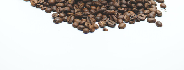 coffee beans on a white background and there is empty space for writing