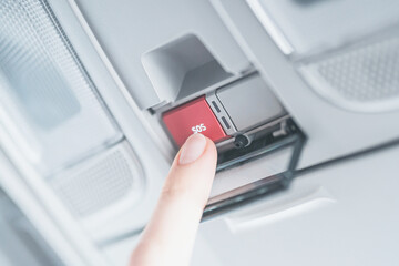 finger presses the button 