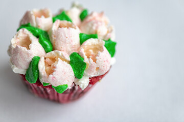 Homemade organic cupcake with butter cream, close-up.