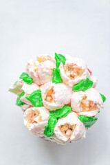 Homemade organic cupcake with butter cream, close-up.