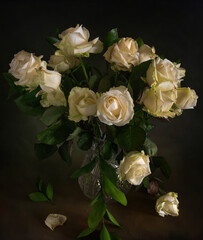 Still life with a bouquet of white withered roses. Vintage.