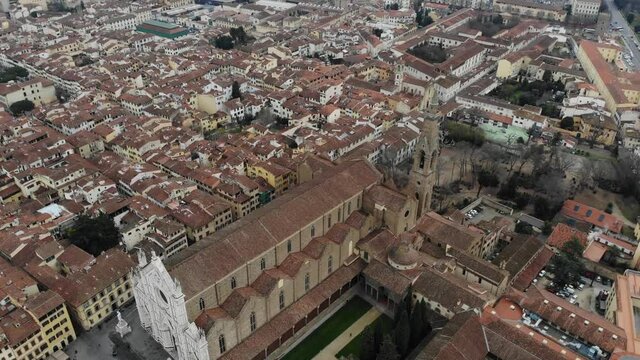 Panorama from a drone to the Basilica of Sant'Acroce. Basilica in the center of Florence. Landmark of the city. The largest Franciscan church in the world.View of Piazza Santa Croce captured by drone