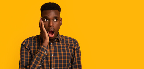 Wow. Portrait Of Amazed Black Male Looking At Copy Space With Excitement