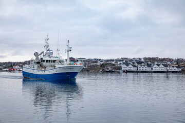 Fototapeta na wymiar Fishing boat Sørbøen through Brønnøysundet, ,Helgeland,Nordland county,Norway,scandinavia,Europe