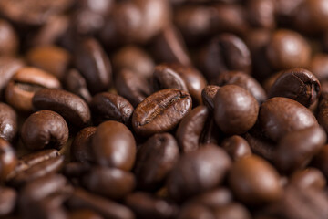 Roasted coffee beans. Bokeh food texture.