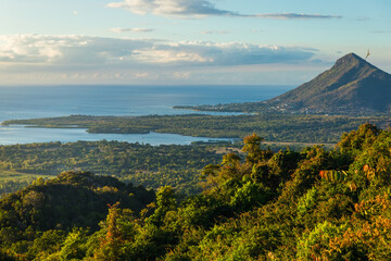 Fototapeta premium View of mountain, ocean and Tamarin in Mauritius.