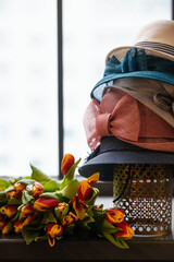 women's hat with a butterfly and flowers tulips