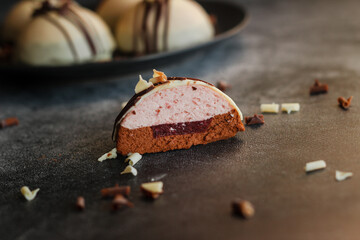 Delicious cakes on the table. Hemispherical cakes. White chocolate cakes