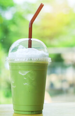 Green tea smoothie on natural background