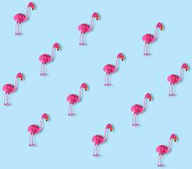 trendy pink flamingo's on a blue background