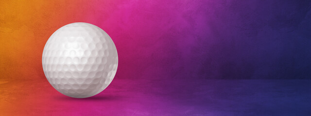 White golf ball on a purple gradient studio banner