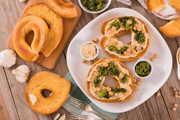 Friselle with turnip tops and hummus. 