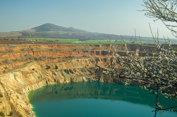 Fototapeta premium late winter view to abandoned Bulgarian mine pit 