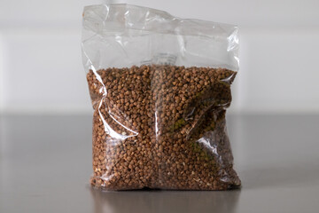sealed plastic bag with buckwheat close up