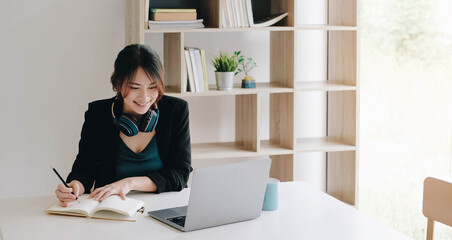 Woman listening to somebody during online lesson or conference