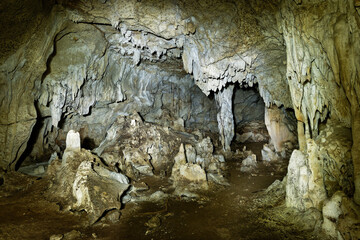 Kiwengwa Caves on Zanzibar island in Tanzania, worship locals ancestors, gifts to the holy stones, stalagmites and stalactites formed by water dissolving coral stones