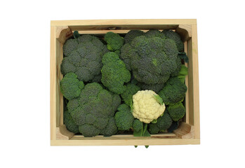 Wooden box with broccoli and cauliflower isolated on a white background