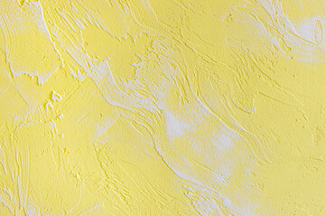 abstract yellow textured cement wall background