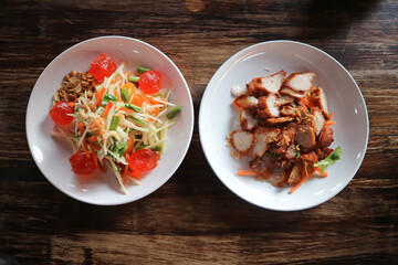 papaya salad, Thai salad and fried pork