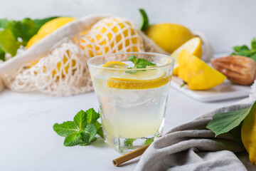 Hard seltzer cocktail with lemon and zero waste bartenders accessories