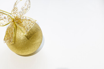 Christmas decorations in gold color on a white background. New Year Holiday Decor Background Texture