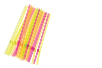 Close up view of colorful drinking straws on white background isolated. 