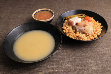 Madrilenian stew dish with soup and meat (cooked)