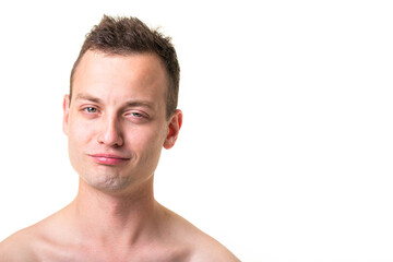 Obraz premium Portrait of a handsome young man on white background, making funny faces