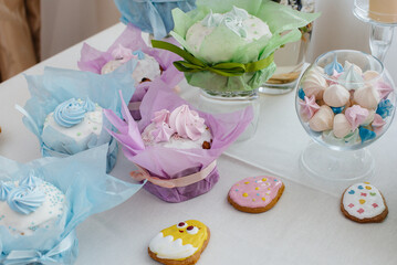Beautiful Easter cakes on a decorated light table. A light holiday of Easter.