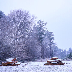 Stacked Stones With Snowy Landscape