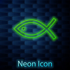 Glowing neon line Christian fish symbol icon isolated on brick wall background. Jesus fish symbol. Vector