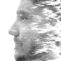 A creative man's profile portrait with a texture effect