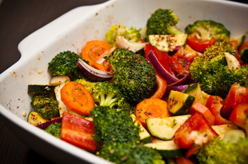 Fried chicken stripes with vegetables dish