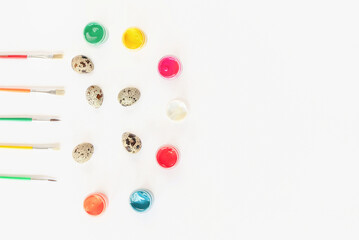 Painting Easter eggs. Natural quail eggs.