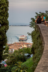 Beautiful view of Desenzano and Lake Garda on an autumn evening. Desenzano, Verona, Italy