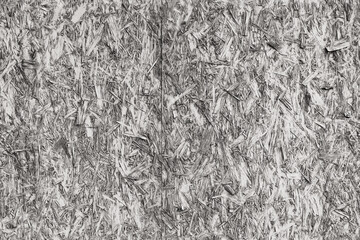 Old oriented strand board or OSB. Seamless background photo