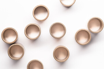 Sleeve bronze bearings on a white background, top view