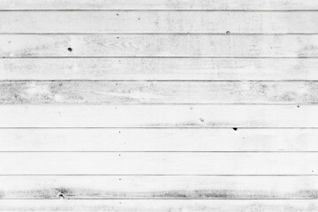 Grungy white wooden wall made of planks. Seamless texture