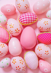 Happy Easter. Pink pastel color eggs variety on pink background