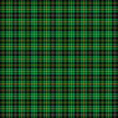 Fototapeta premium St. Patricks day tartan plaid. Scottish pattern in green and orange cage. Scottish cage. Traditional Scottish checkered background. Seamless fabric texture. Vector illustration