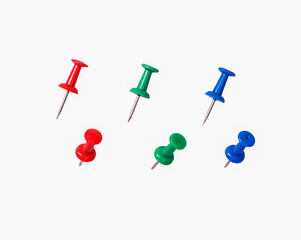 Stationery multi-colored buttons isolated on a white background. Office stationery.