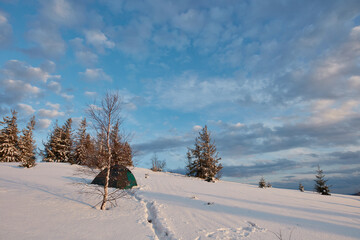 camping in the winter mountains